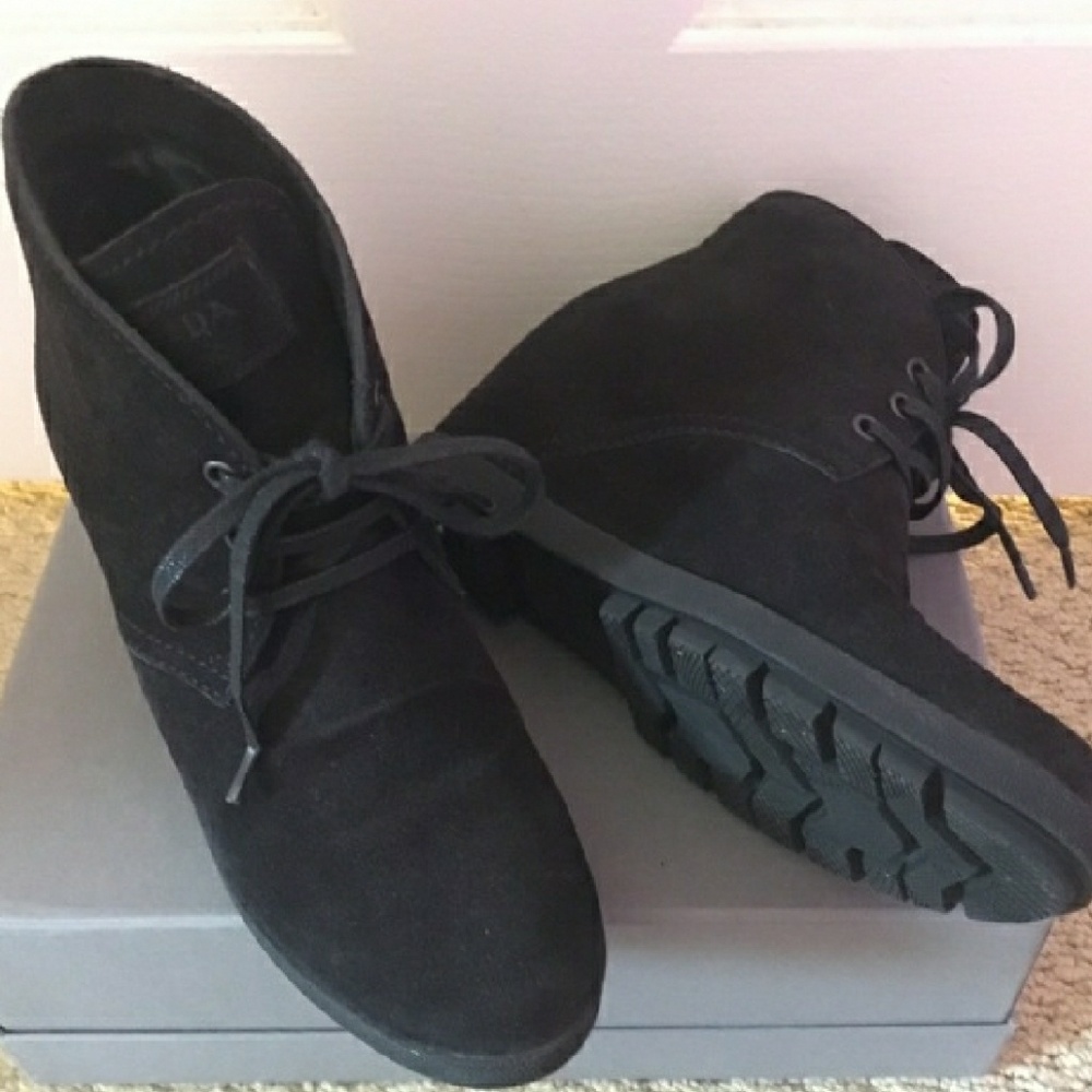 Like new Prada booties.